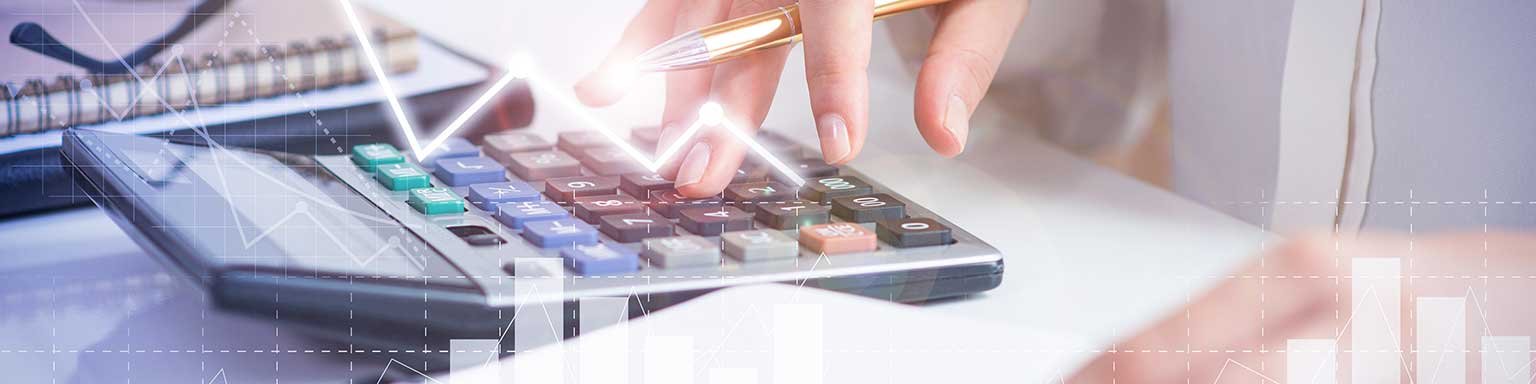 Accountant calculating profit with financial analysis graphs