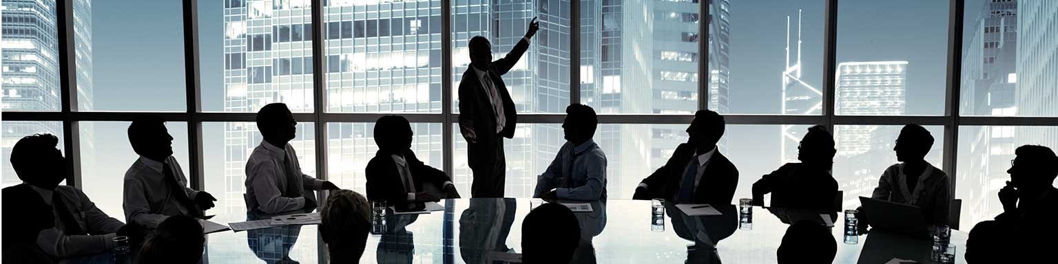 Business people board room meeting